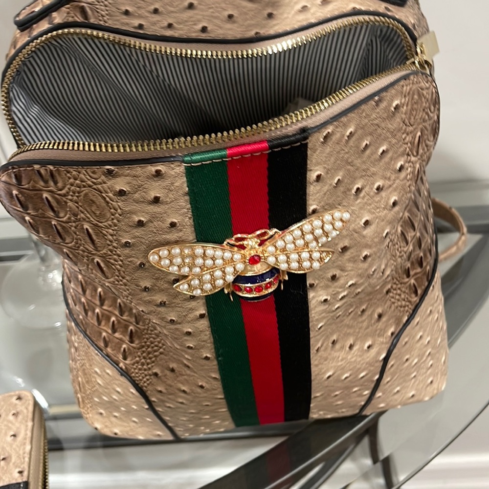 A sweet little matching backpack with wallet
